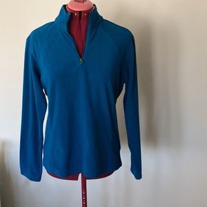 Columbia teal blue 7” zip opening. Size Large. High neck sweater 100% polyester